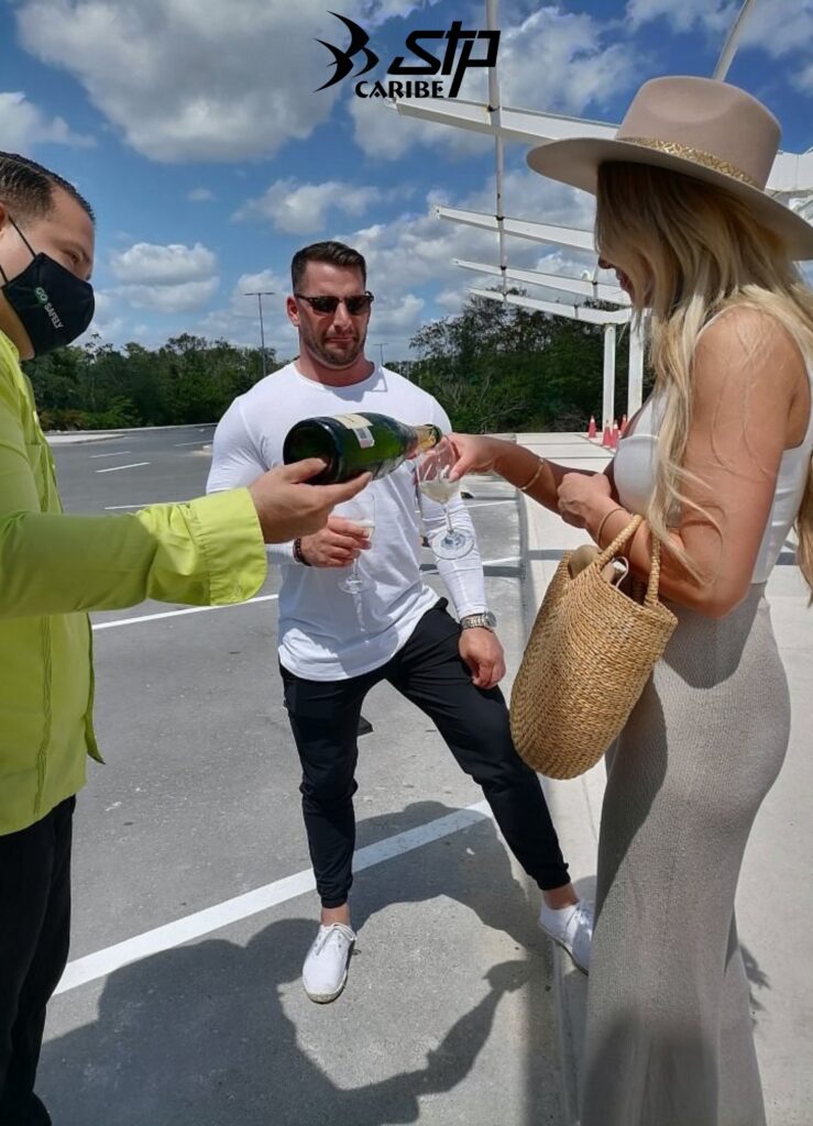 RECIVING YOUR FUTURE CUSTOMERS WITH CHAMPAGNE AT THE CANCUN AIRPORT OR TULUM AIRPORT WITH THE BEST LOCAL AND LUXURIOUS TRANSPORTATION SERVICES